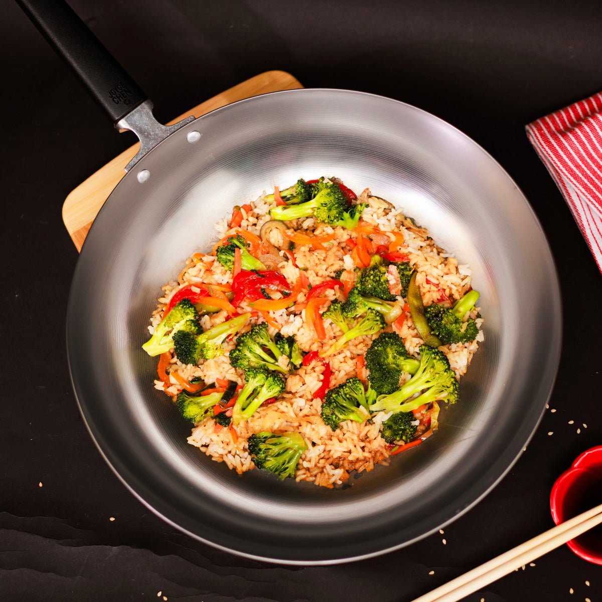 J22-0050 - Joyce Chen Uncoated Carbon Steel Stir Fry Pan with Phenolic Handle, 12"