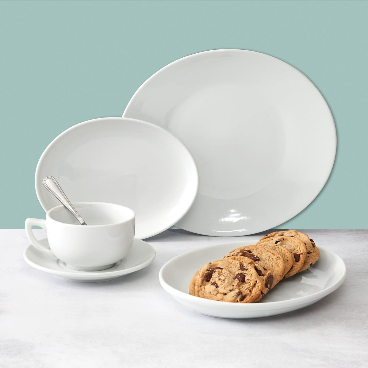 OKP-12PL - Brechia Porcelain Coupe Oval Platter, 12"L x 10-1/2"W x 1-1/2"H - White (12 Pieces/Case)